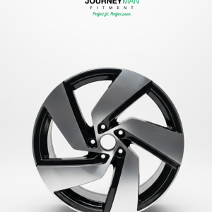 Journeyman Fitment high-gloss black split-spoke performance rim for luxury and sport vehicles.