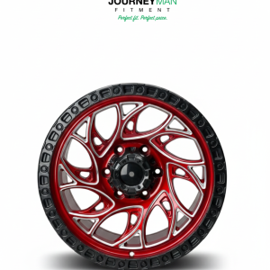 Journeyman Fitment red and chrome off-road wheel with intricate mesh design and black beadlock-style rim on a white background